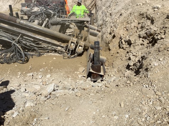 Drilling for Micropiles Construction equipment drills into the ground.