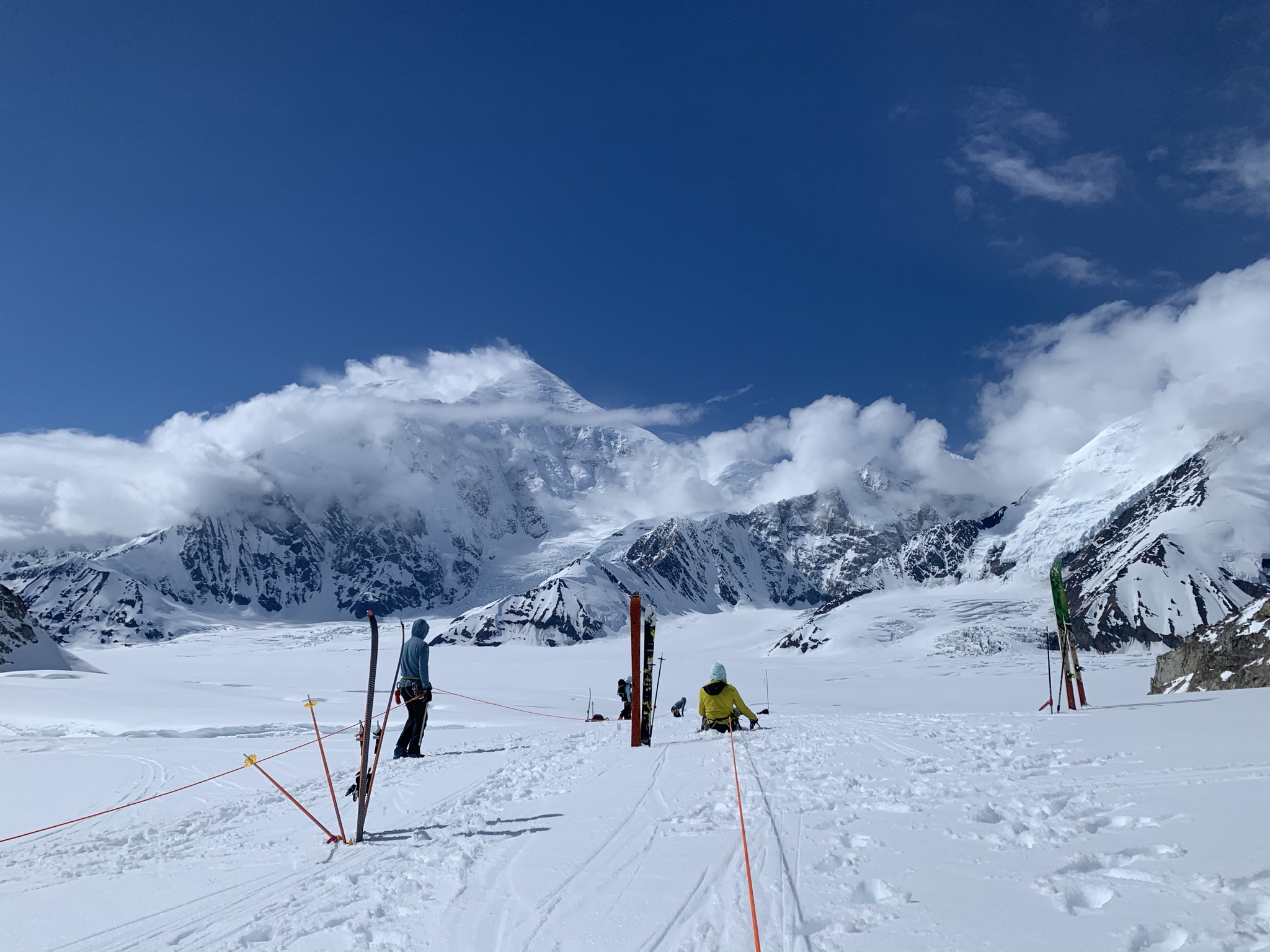 Rangers practice crevasse rescue skills on a glacier