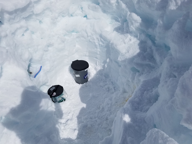 Snow pit with CMC and camp toilet