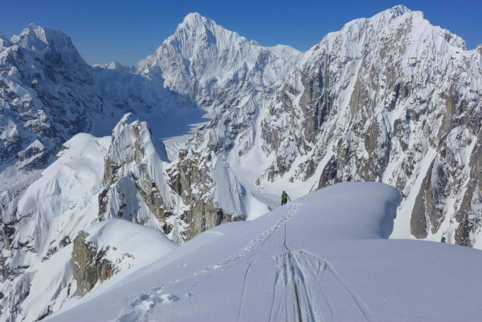 View of steep rock and snow-covered peaks