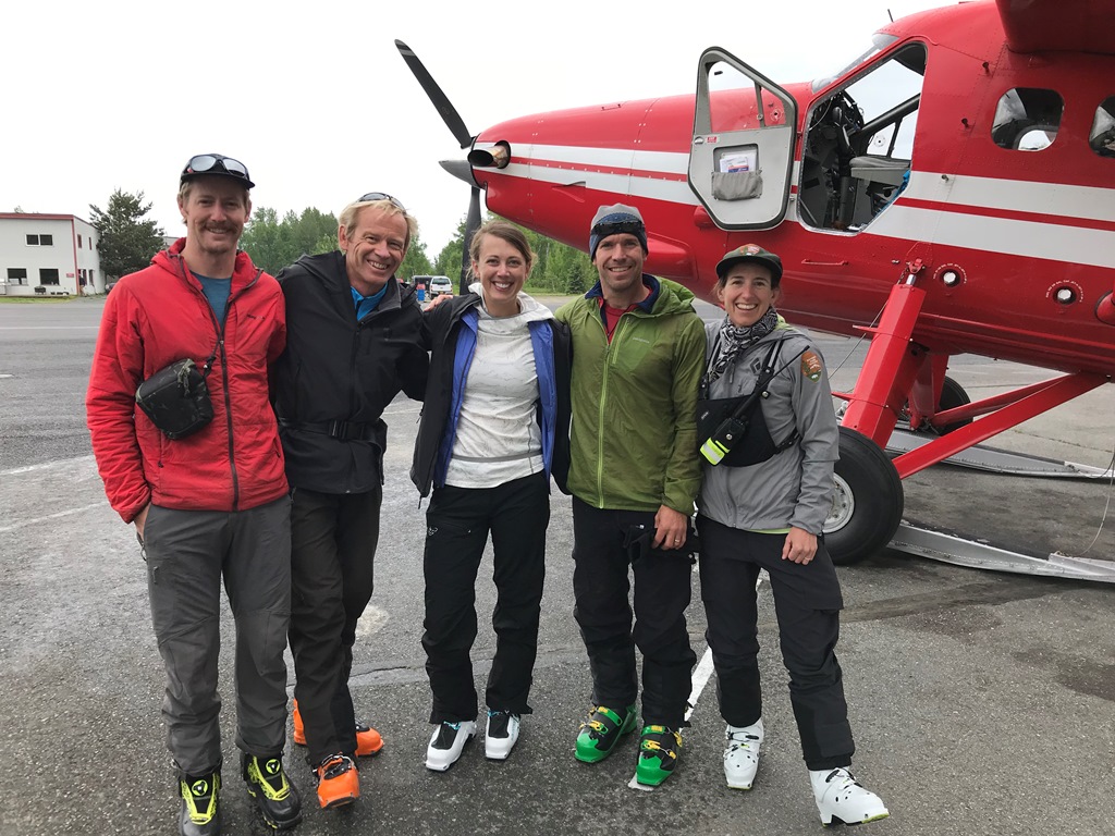 Five patrol members ready to board their small aircraft en route Basecamp.