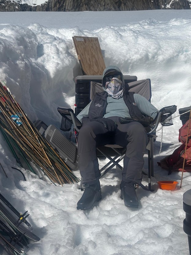 14K Patrol #7 VIP Susan Goodwin A ranger sits in a chair wearing UV protection gear