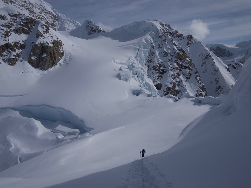 Ranger traversing a glacier basin