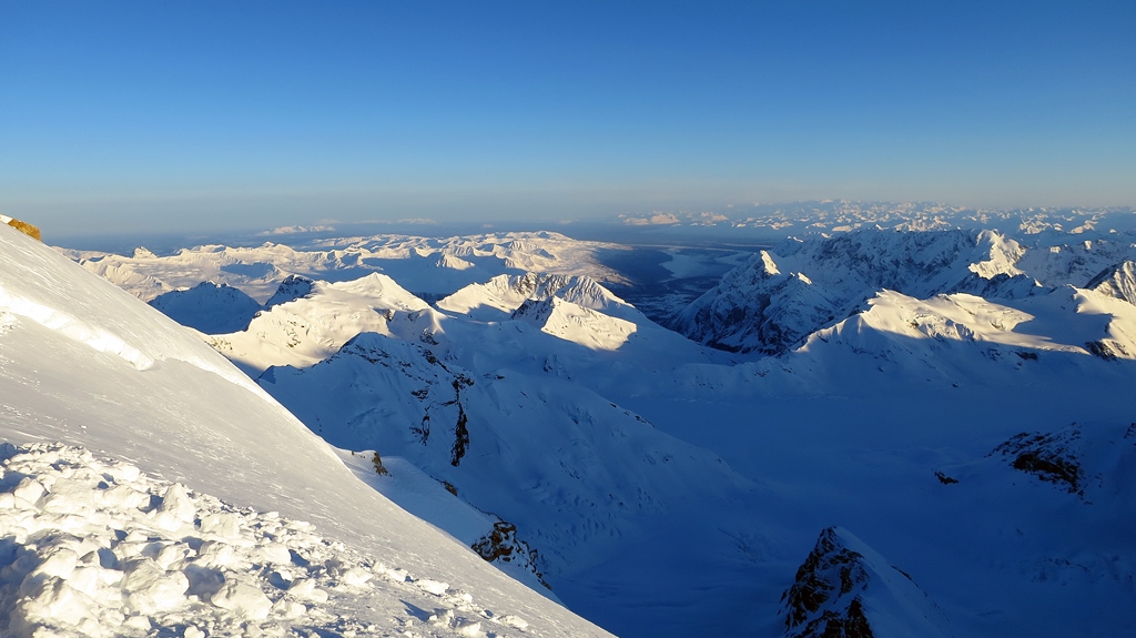 View from a high ridge looking down into a valley