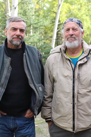 two men posing for a photo