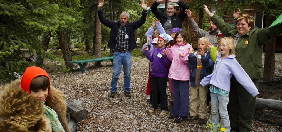 a teacher-ranger-teacher teaches campers about bear safety a teacher-ranger-teacher teaches campers about bear safety