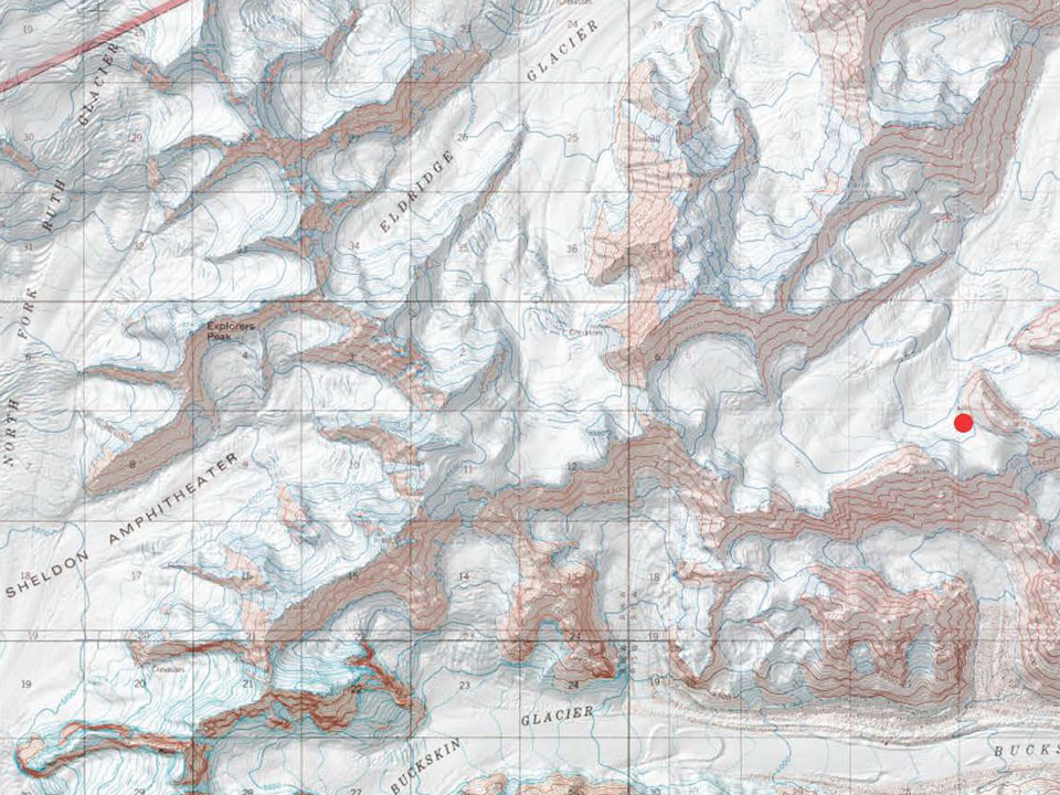 a topographic map of mountains and glaciers with a red dot marking a fatal incident
