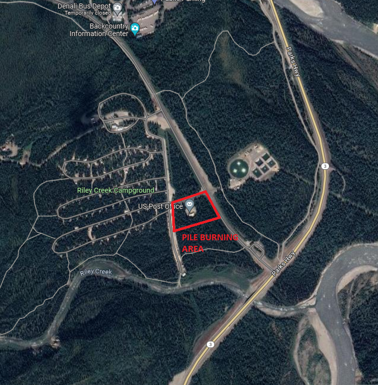 Map of the park entrance area. An area around the Denali Post Office, reaching east to the Denali Park Road and west to the Riley Creek Day Use area road, is outlined in red and labeled as the pile burning area.