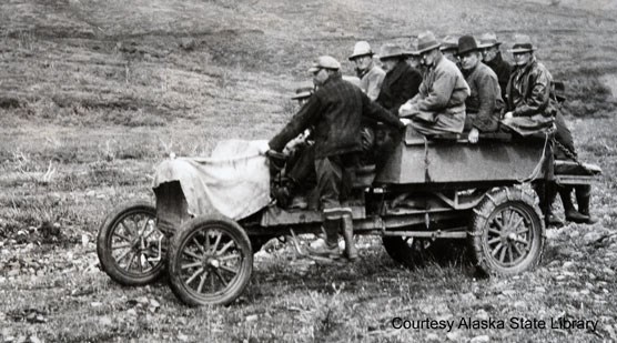 People on a vehicle, early 20th century