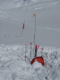 Cache site marked with wands