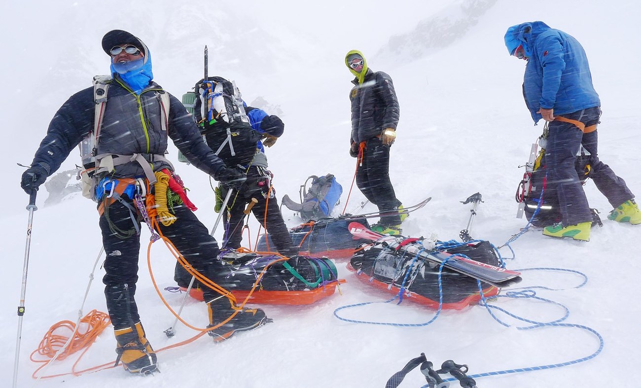 Mountaineers on a glacier in a snowstorm