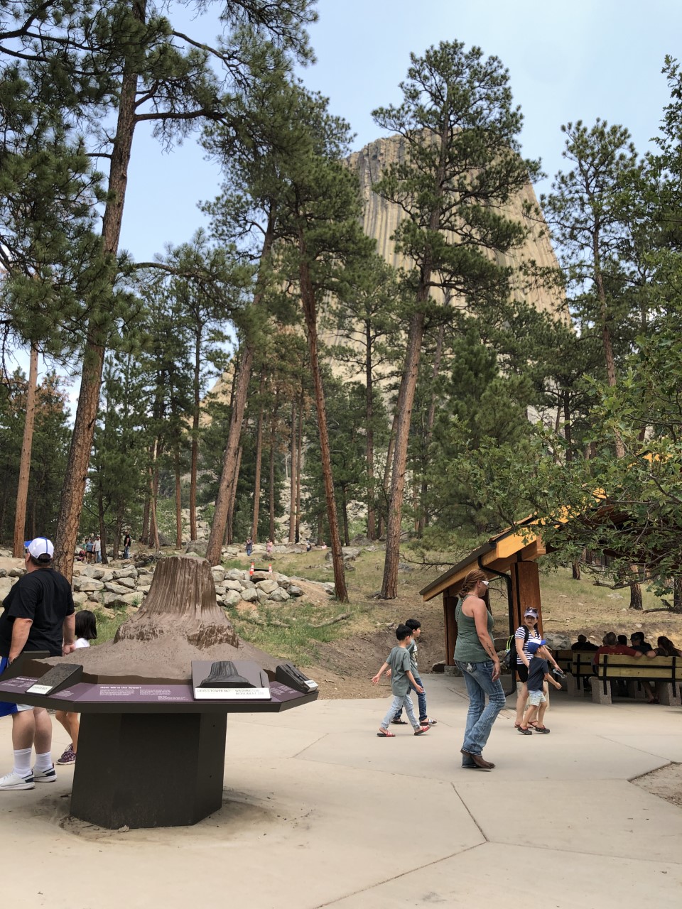 Family walking on a concrete accessible trail