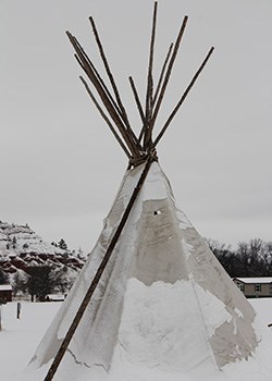 A tipila (tipi) set up in the snow