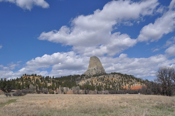 A view of Devils Tower from a distance