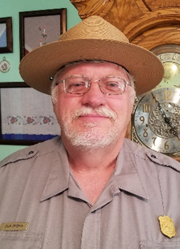 Doug Crossen Man with ranger uniform with glasses and white goatee