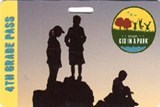 A park pass showing the silhouettes of kids standing on rocks