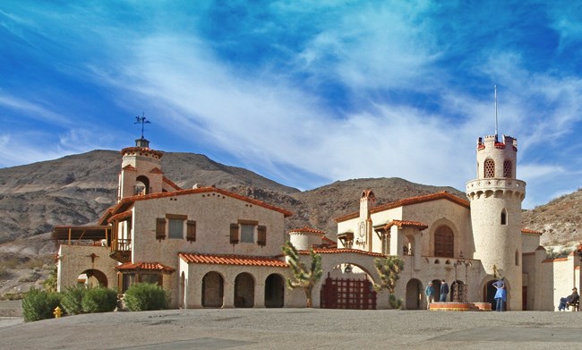 a large castle building in desert scenery