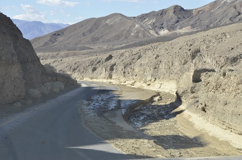 Shoulder damage on Artist Drive Road before repairs.