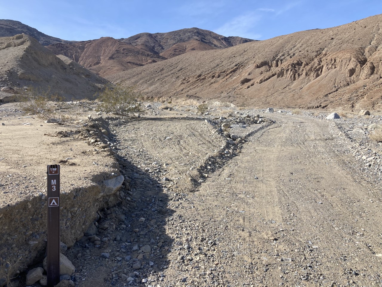 Campsite M3 Site #M3 along Marble Canyon Road, gravel road takes up most of image.