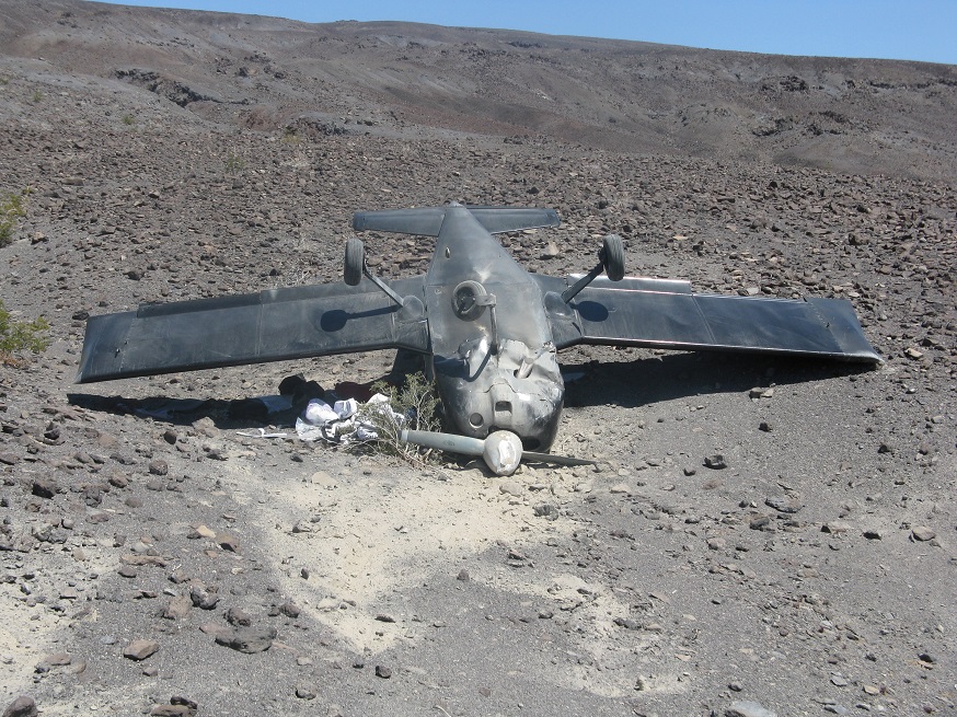 Small plane flipped onto its roof at remote Saline Valley airstrip.