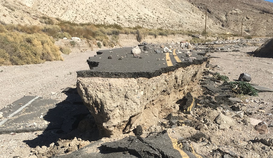 A small island of intact pavement is surrounded by about a 4 foot drop on all sides.