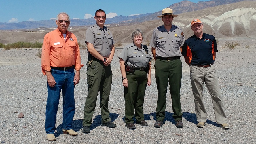 NPS and RAF work together. Superintendent Mike Reynolds and other NPS employees stand for a photo with two men from RAF.