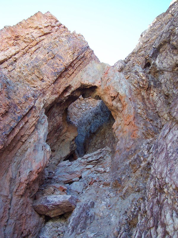 An arch formation along a canyon wall.