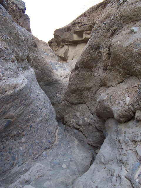 Polished marble walls tightly wind in a narrow section of canyon