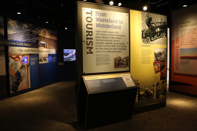 Exhibits on death valley tourism with additional exhibits in the background. Exhibits on death valley tourism with additional exhibits in the background.
