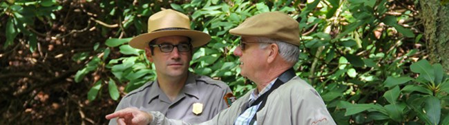 man talking to a park ranger