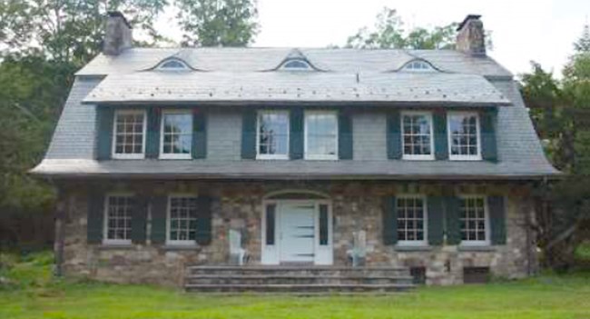 Zimmermann House front view of 2-1/2 story fieldstone house with gable roof