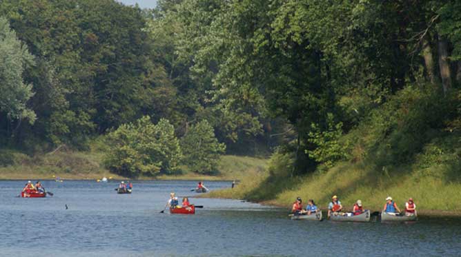 Paddling on the River People paddling canoes and kayaks on the Delaware River.