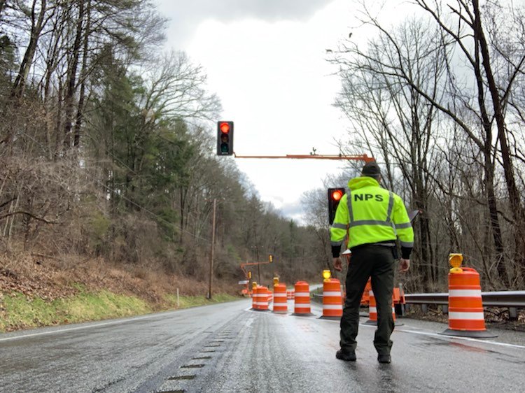 Temporary Traffic Lights Installed on Route 209 A park employee stands on Route 209 and checks the newly installed traffic lights.
