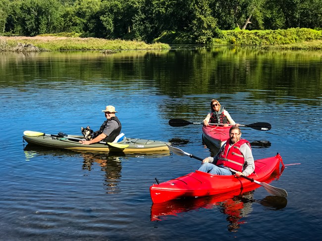Happy kayakers enjoying the Delaware River on a summer day. NPS Photo Courtesy of Kent Sweigert