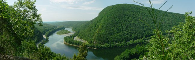 view of river passing between two mountains