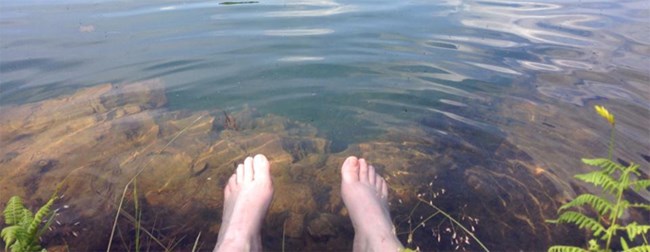 bare feet in pond