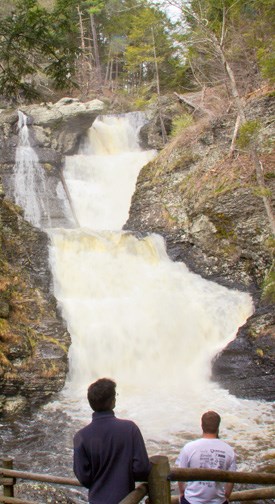 two people viewing waterfall two people viewing waterfall