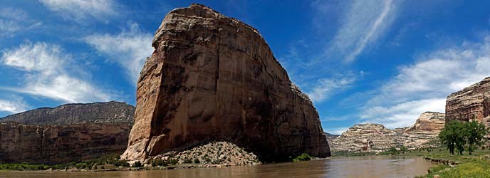 Steamboat Rock rises above the Green River and dominates the view in Echo Park. Steamboat Rock rises above the Green River and dominates the view in Echo Park.
