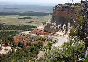 Harpers Corner Road winds around Plug Hat Butte Harpers Corner Road winds around Plug Hat Butte