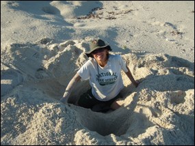 NPS biologist inventorying a sea turtle nest