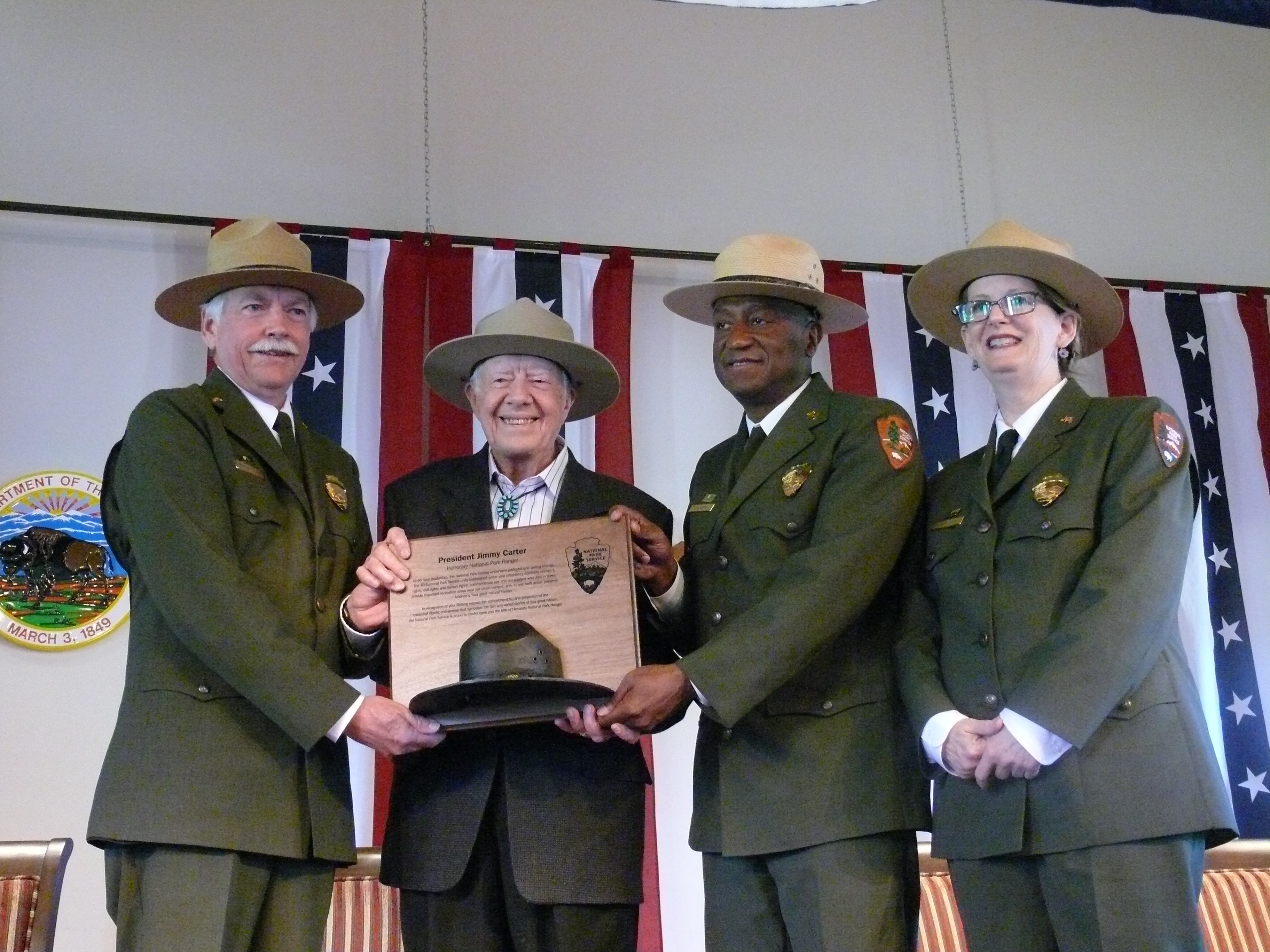 National Park Service Director Jonathan B. Jarvis, Former President Jimmy Carter, NPS Southeast Region Director Stan Austin and Jimmy Carter National Historic Site Superintendent Barbara Judy