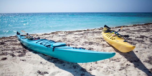 Two kayaks on a beach