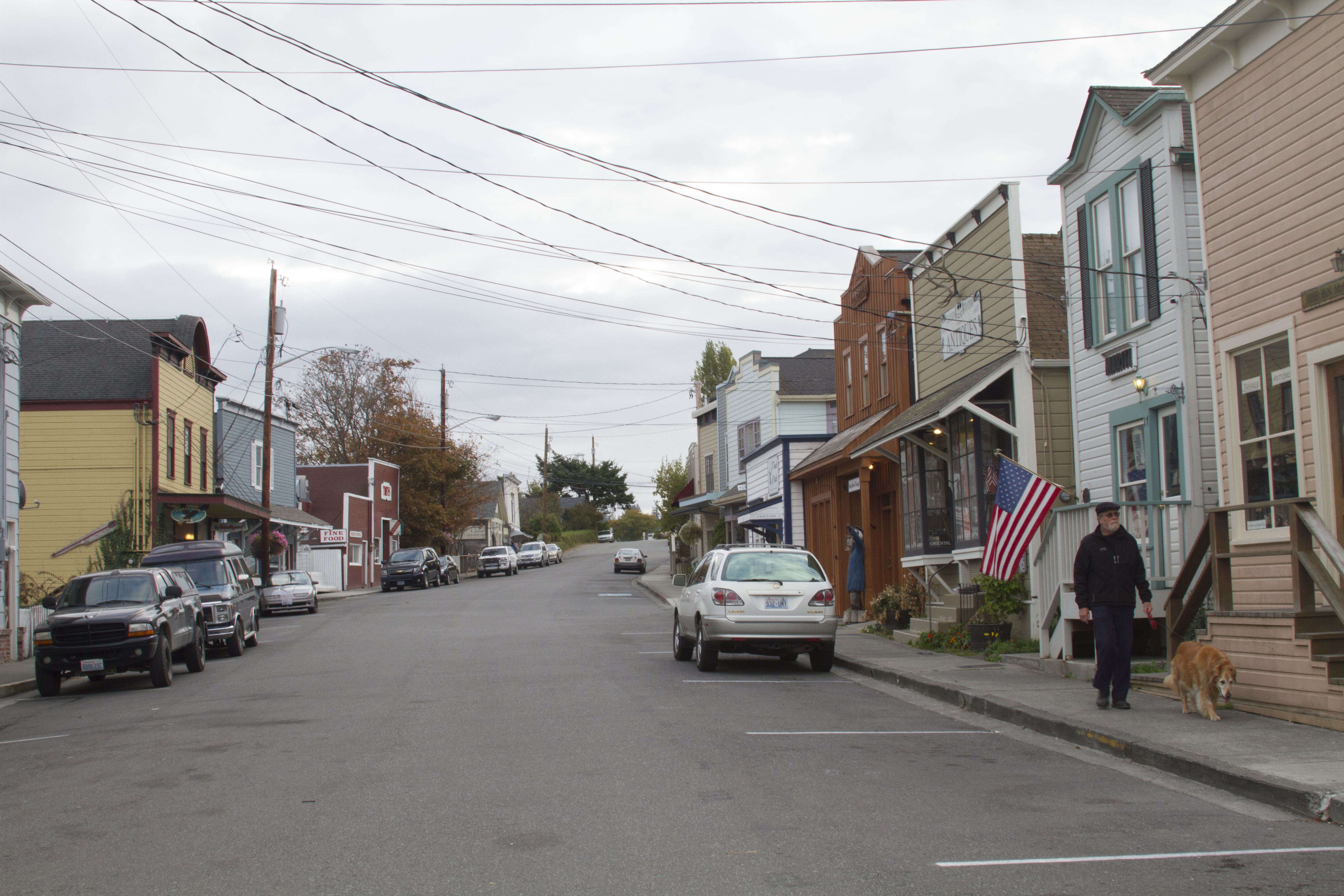 View up the street with buildings on either side. View up the street with buildings on either side.