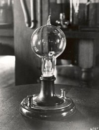 Black and white photograph from 1929 of a replica of Thomas Edison's first working lightbulb. Black and white photograph from 1929 of a replica of Thomas Edison's first working lightbulb.