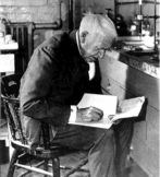 Thomas Edison taking notes in his chemistry lab.