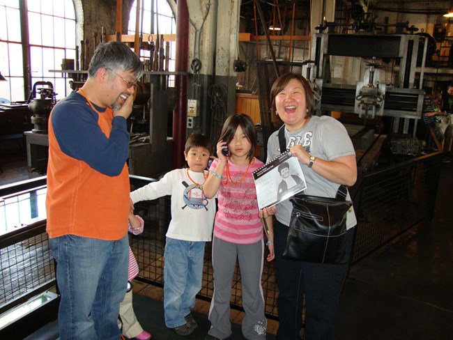 The Terrell family in the machine shop learning about Thomas Edison and working on the Junior Ranger booklet. The Terrell family in the machine shop learning about Thomas Edison and working on the Junior Ranger booklet.