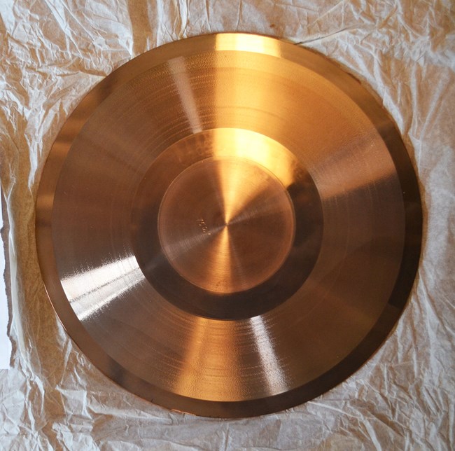 An “unsealed Master Mold” has a negative groove profile made of copper.