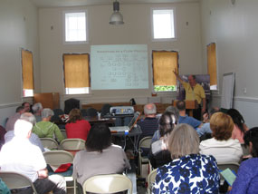 Volunteer conference participants listen as W. Bernard Carlson speaks about Thomas Edison. Volunteer conference participants listen as W. Bernard Carlson speaks about Thomas Edison.