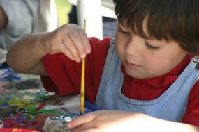 Child Painting in Kids Activity at HawkWatch