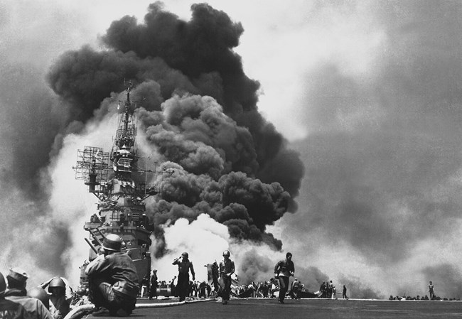 USS Bunker Hill is hit by two kamikaze planes in May 1945